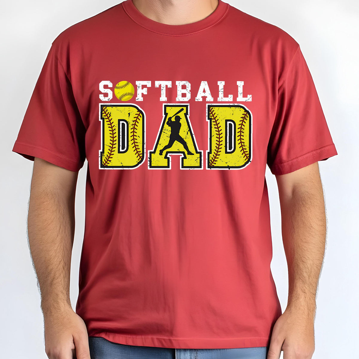 May include: Red t-shirt with a distressed white graphic that says "Softball Dad" with a softball and a silhouette of a player hitting a ball.