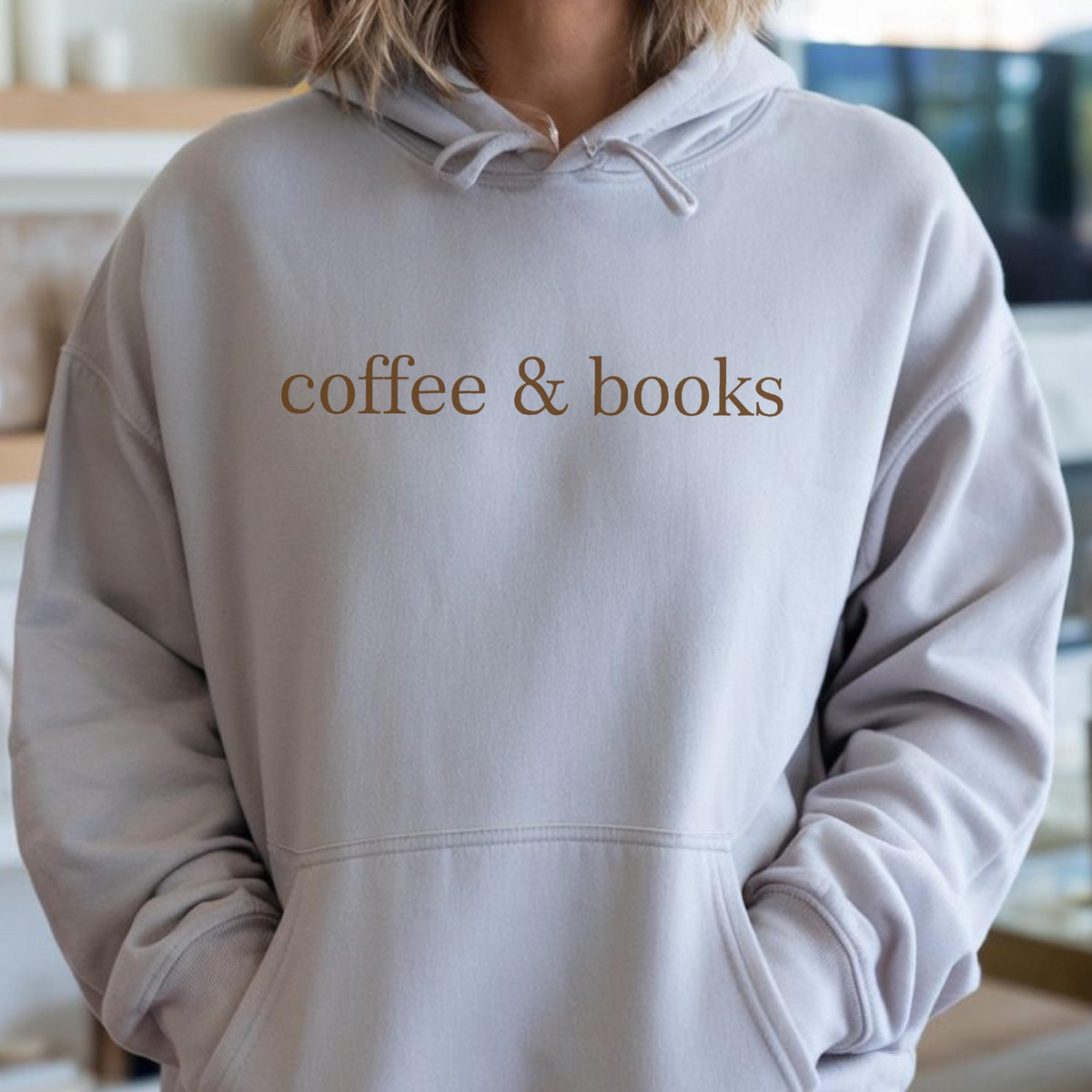 May include: A light gray hoodie with a brown print that says "coffee & books".