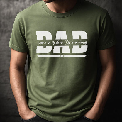 May include: Olive green t-shirt with the word "DAD" in large white block letters. Below the word "DAD" are the names Emma, Noah, Olivia, and Henry. A white star is centered below the word "DAD".
