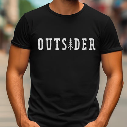 May include: A black short-sleeved t-shirt featuring the white distressed-style text OUTSIDER printed across the chest. The letter I is replaced by a stylized white graphic of a pine tree. The shirt has a crew neckline and a standard fit.