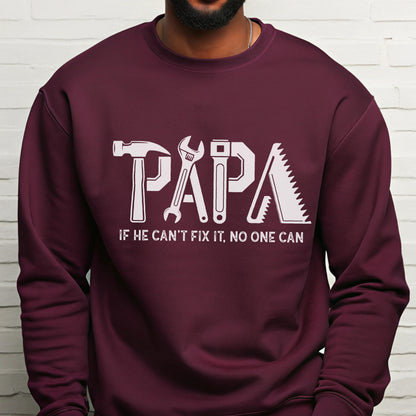 May include: Burgundy sweatshirt with the word "PAPA" in white, formed by tools: a hammer, wrench, adjustable wrench, and saw. Below the word "PAPA" is the text "IF HE CAN'T FIX IT, NO ONE CAN."