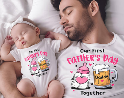 May include: A white onesie with the text "Our First Father's Day Together" and illustrations of a baby bottle and a beer mug. A man and a baby are sleeping. The baby is wearing the onesie and a white headband.