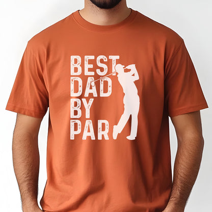May include: A burnt orange short-sleeved t-shirt featuring a white graphic print. The design includes the text "BEST DAD BY PAR" in a distressed, block-style font next to a white silhouette of a golfer in a mid-swing position with a golf club.