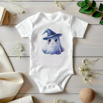 May include: White baby onesie featuring a watercolor illustration of a friendly ghost wearing a blue witch hat. The ghost has heart-shaped cheeks and a smiling expression. The onesie is made of soft material and has short sleeves.