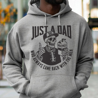 May include: Gray hoodie with a graphic featuring a skeleton wearing a baseball cap that says "DAD" and holding a milk carton. The text reads "JUST A DAD WHO ALWAYS CAME BACK WITH THE MILK."