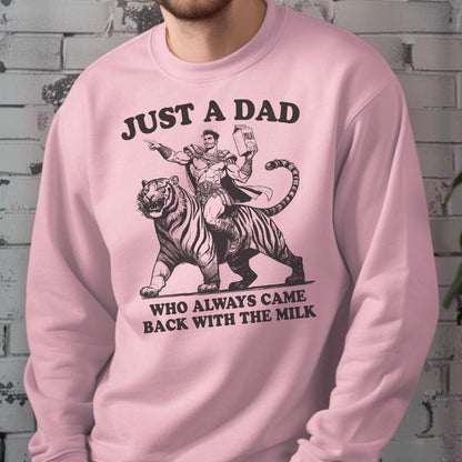 May include: Pink sweatshirt with the text "JUST A DAD WHO ALWAYS CAME BACK WITH THE MILK." The graphic depicts a man riding a tiger, holding a milk carton. The design is in black and white.