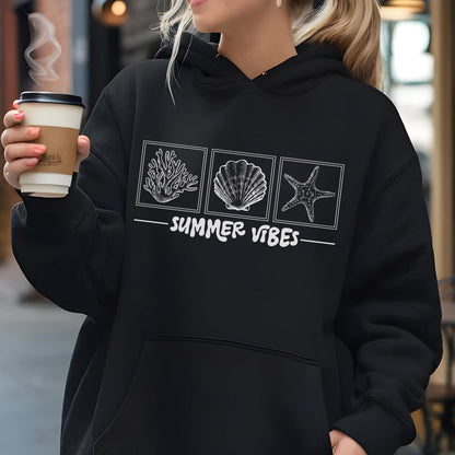 May include: Black hoodie with a white graphic featuring a coral, seashell, and starfish design. The text "SUMMER VIBES" is printed below the images. The hoodie has a drawstring hood and a front pocket.