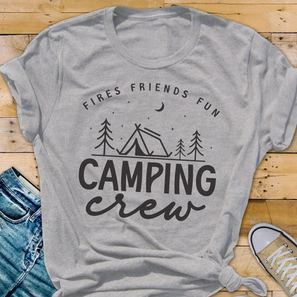 May include: A gray t-shirt with the words "Fires Friends Fun" above a camping scene and the words "Camping Crew" in a script font. The design includes a tent, trees, a crescent moon, and stars.