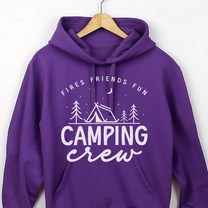May include: A purple hooded sweatshirt with the words "Fires Friends Fun" and "Camping Crew" in white. The design includes a tent, trees, a crescent moon, and stars. The sweatshirt is hanging on a wooden hanger.