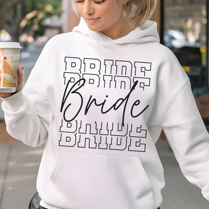 May include: A white hooded sweatshirt featuring a graphic design on the front. The design consists of the word BRIDE in a black outlined block font repeated four times, with the word Bride in a black cursive script layered over the center.