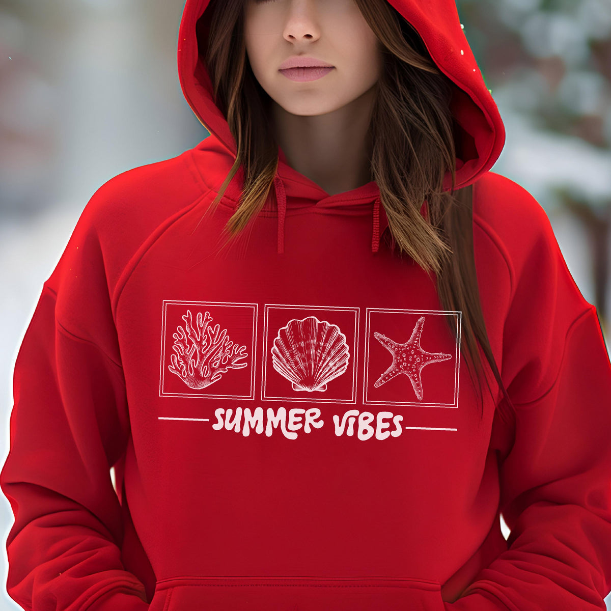 May include: A red hooded sweatshirt with a white graphic featuring a coral, seashell, and starfish design. The text "SUMMER VIBES" is below the graphics. The sweatshirt has a drawstring hood and a front pocket.