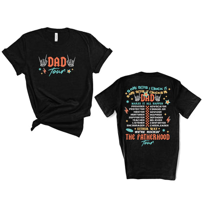 May include: Black t-shirts with the text "DAD Tour" and a graphic of skeleton hands. The back of the shirt has the text "Some days I rock it, some days it rocks me, Dad" and a list of roles.