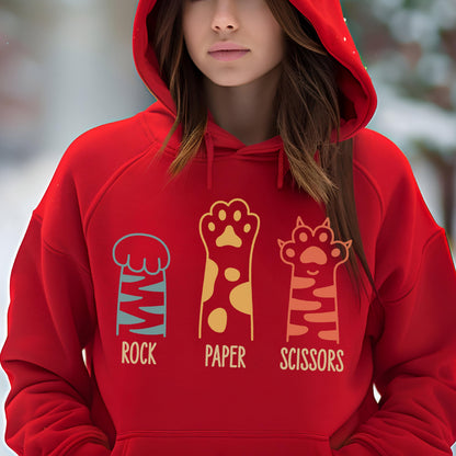 May include: A bright red hooded sweatshirt featuring a graphic print of three animal paws. The first paw is blue with stripes labeled ROCK, the second is yellow with spots labeled PAPER, and the third is orange with stripes labeled SCISSORS.