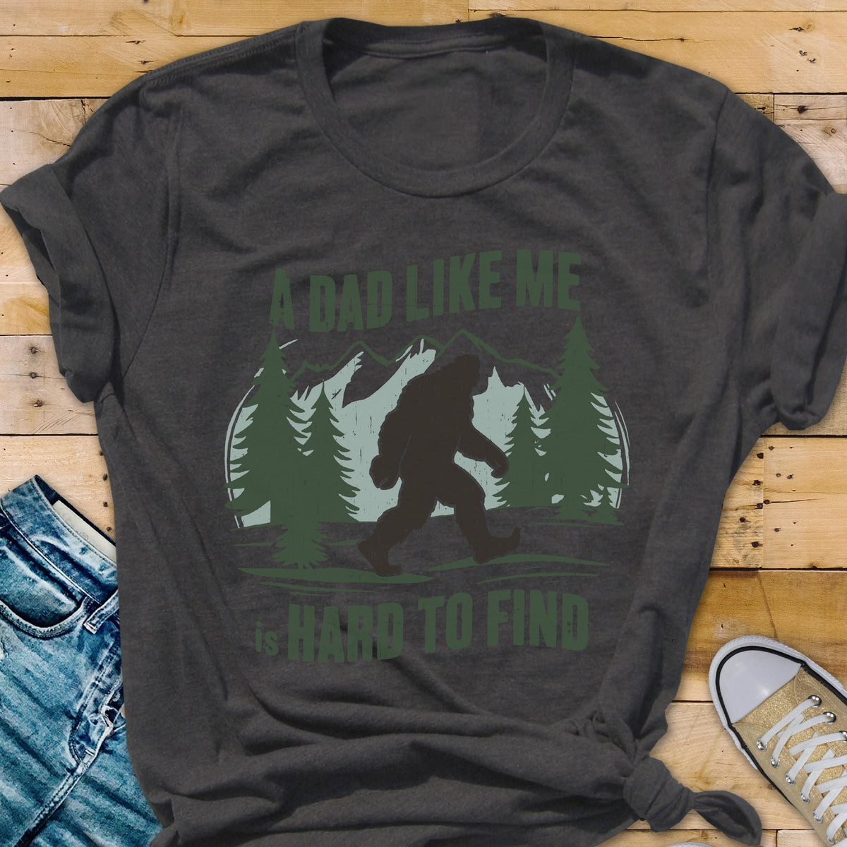 Funny Bigfoot Dad Shirt, A Dad Like Me Is Hard To Find Tee, Sasquatch Father’s Day Gift, Wilderness Dad T-Shirt, Forest Style Tees