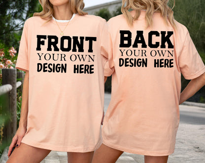 May include: Peach-colored t-shirt with the text "FRONT YOUR OWN DESIGN HERE" on the front and "BACK YOUR OWN DESIGN HERE" on the back in bold black letters. The shirt is a short-sleeved, casual style.