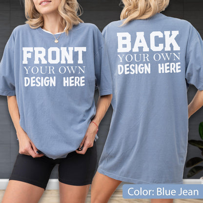 May include: Blue jean colored t-shirt with the words "FRONT YOUR OWN DESIGN HERE" on the front and "BACK YOUR OWN DESIGN HERE" on the back. The shirt is a short-sleeved, oversized style.