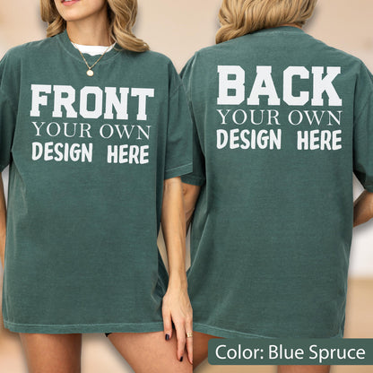 May include: Blue spruce colored t-shirt with the text "FRONT YOUR OWN DESIGN HERE" on the front and "BACK YOUR OWN DESIGN HERE" on the back. The shirt is a solid color and has short sleeves.