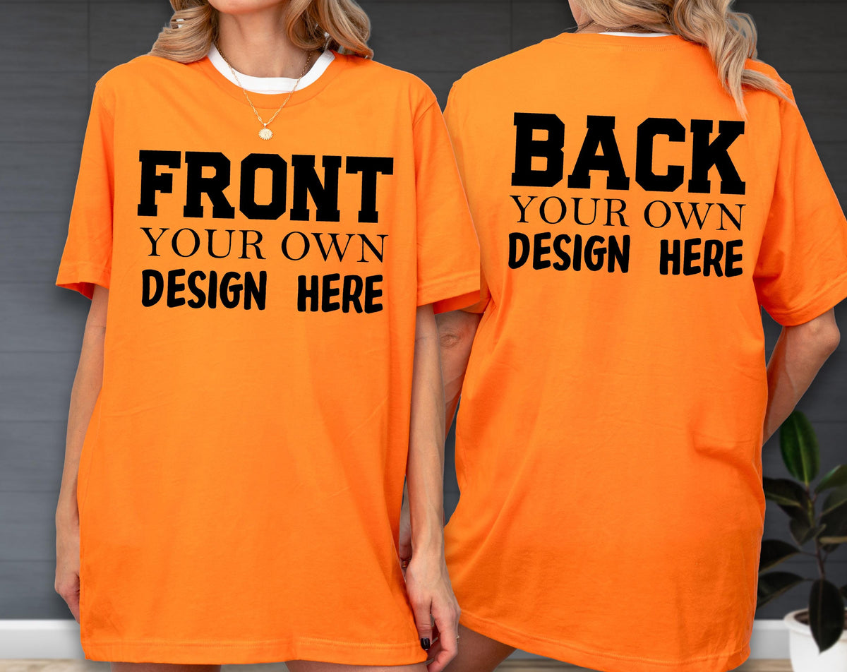 May include: Orange t-shirts with black text. The front of the shirt reads "FRONT YOUR OWN DESIGN HERE." The back of the shirt reads "BACK YOUR OWN DESIGN HERE."