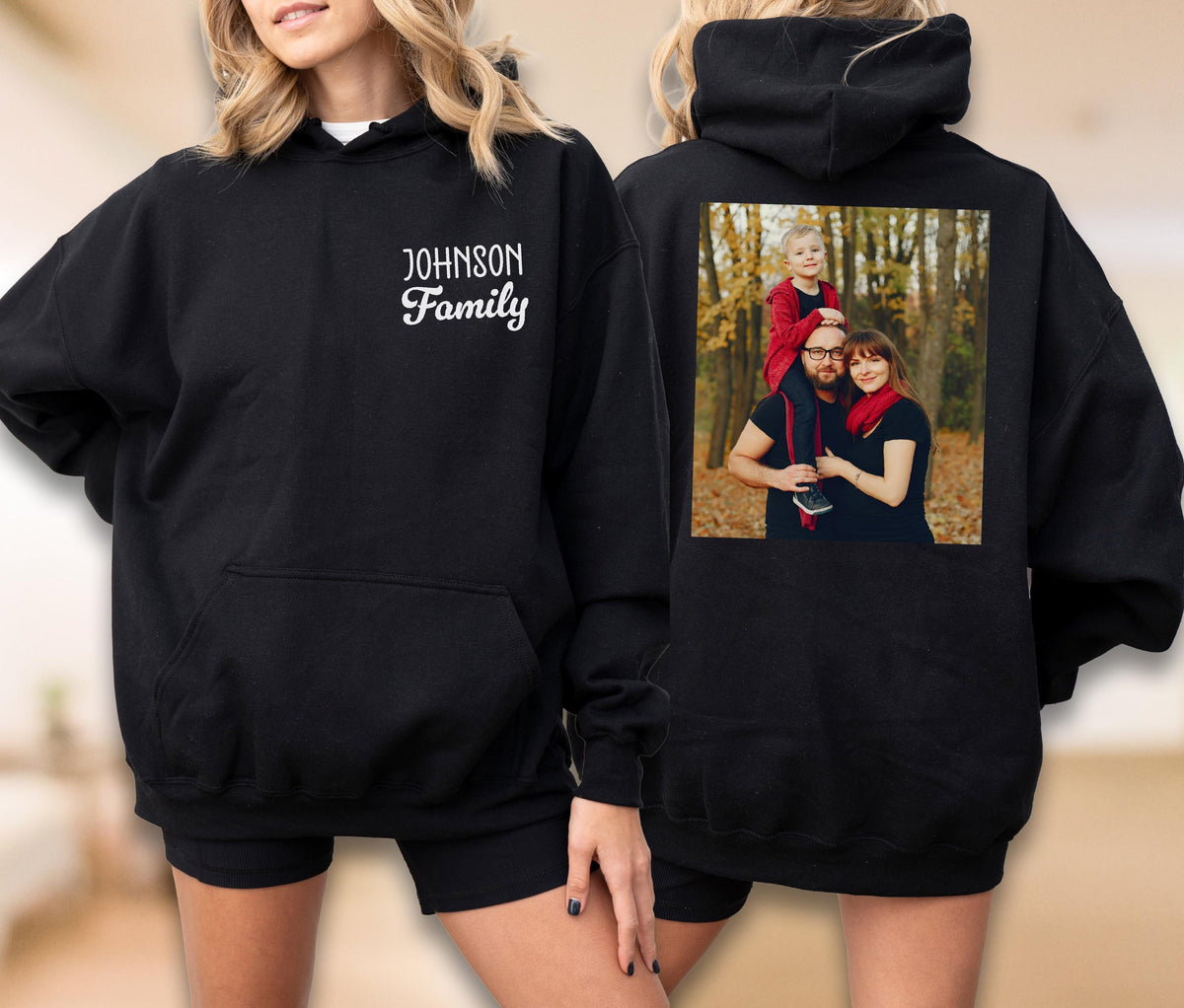 May include: Black hooded sweatshirt with a front pocket and the text "JOHNSON Family" in white script. The back of the sweatshirt features a family photo. A comfortable and personalized apparel item.