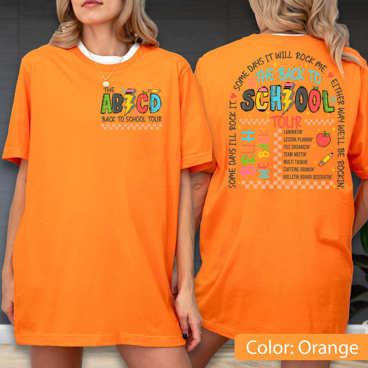 May include: Orange t-shirt with a white collar featuring the text "THE ABZCD BACK TO SCHOOL TOUR" on the front. The back of the shirt has the text "THE BACK TO SCHOOL TOUR" and a list of school-related activities. The shirt's color is orange.