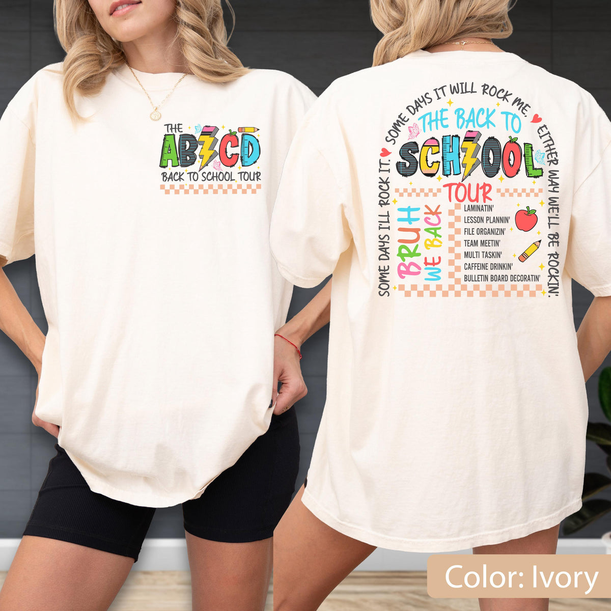 May include: Ivory-colored t-shirt with the text "THE AB⚡️CD BACK TO SCHOOL TOUR" on the front. The back of the shirt says "THE BACK TO SCHOOL TOUR" with a list of school-related activities. The shirt is a comfortable, casual style.