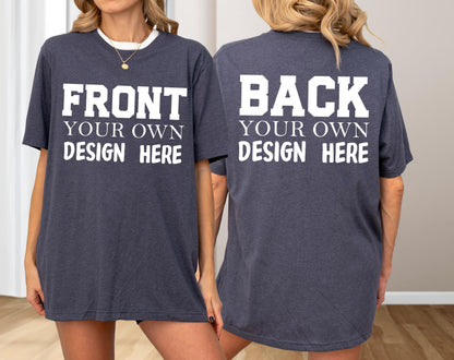 May include: A dark gray t-shirt with white text on the front that reads "FRONT YOUR OWN DESIGN HERE." The back of the shirt has the text "BACK YOUR OWN DESIGN HERE." The shirt has a white collar.