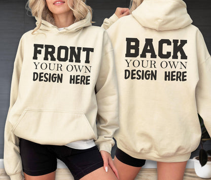 May include: Cream-colored hoodie with the text "FRONT YOUR OWN DESIGN HERE" on the front and "BACK YOUR OWN DESIGN HERE" on the back. The hoodie has a front pocket and a hood. The design is in a bold, black font.