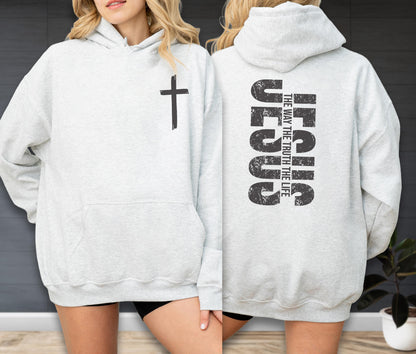 May include: Light gray hoodie with a black cross on the front and the words "JESUS THE WAY THE TRUTH THE LIFE" printed vertically on the back. The hoodie has a front pocket and a hood.