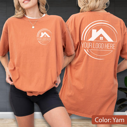 May include: A yam-colored t-shirt with a white logo on the front and back. The logo features a house silhouette inside a circle with the text "YOUR LOGO HERE". The shirt is a short-sleeved, oversized style.