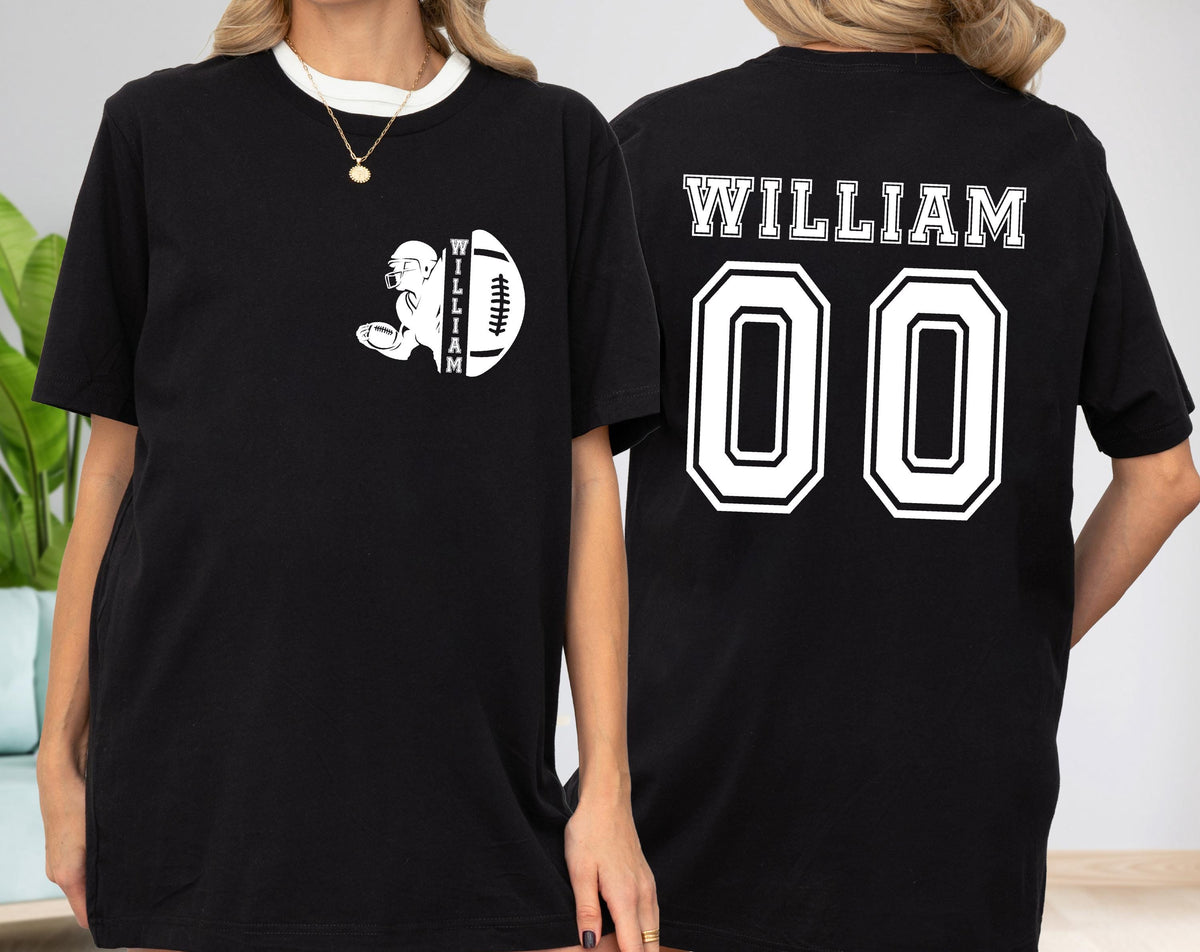 May include: Black t-shirt with a white football and helmet graphic on the front. The back of the shirt displays the name "WILLIAM" above the number "00" in white block lettering. The shirt has a crew neck and short sleeves.