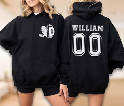 May include: A black hooded sweatshirt featuring a white graphic on the front left chest of a football player silhouette and a football with the name WILLIAM. The back displays the name WILLIAM in white letters above the large white number 00.