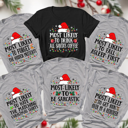 May include: A collection of Christmas-themed t-shirts in various colors, including gray and black. Each shirt features a Santa hat and text like "Most Likely to Drink All Santa's Coffee" and "Most Likely to Forget the Hidden Presents."