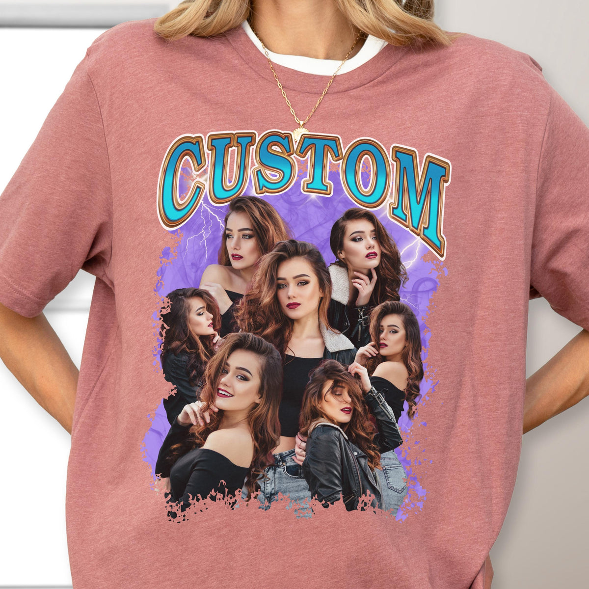 May include: A mauve-colored t-shirt featuring a graphic design with the word "CUSTOM" in a retro font. The design includes a collage of women with long brown hair, set against a purple background with lightning bolts.