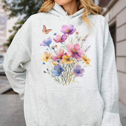 May include: A light gray hoodie featuring a watercolor floral design. The design includes a bouquet of colorful flowers in shades of pink, purple, yellow, and blue, with a small orange butterfly. The hoodie has a front pocket and a hood.