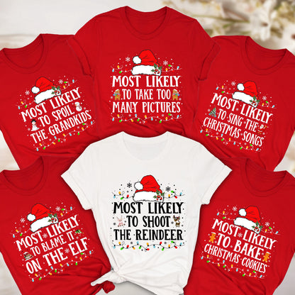 May include: A collection of red and white Christmas-themed t-shirts. Each shirt features a Santa hat and text like "Most Likely to Spoil the Grandkids" or "Most Likely to Bake Christmas Cookies". Festive and fun apparel for the holiday season.