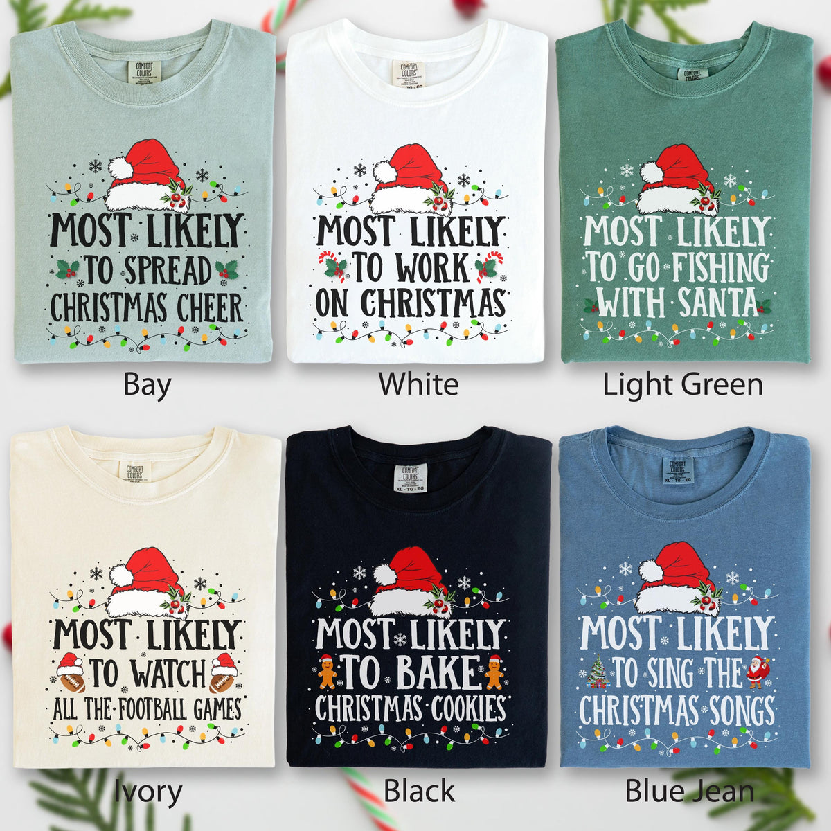 May include: Six crew neck t-shirts in bay, white, light green, ivory, black, and blue jean colors. Each shirt features a red Santa hat graphic, festive string lights, and unique Christmas-themed text including Most Likely To phrases.