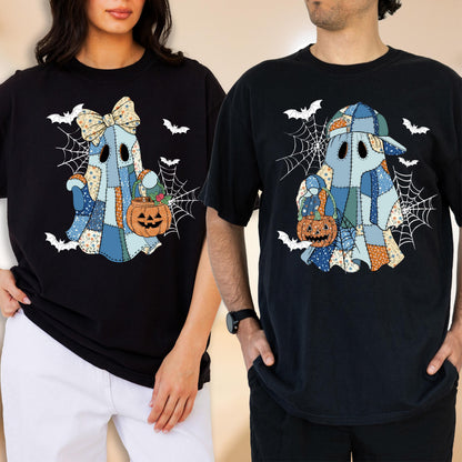May include: Two black t-shirts featuring a patchwork ghost graphic. The left ghost wears a bow, the right ghost wears a baseball cap. Both ghosts hold orange jack-o'-lantern buckets against a background of white spiderwebs and flying bats.