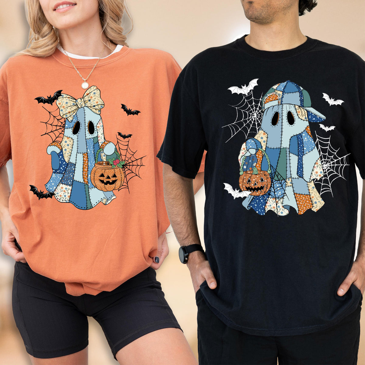 May include: An orange t-shirt and a black t-shirt, each featuring a graphic of a ghost made of blue and orange patchwork fabric. The ghosts are wearing hats, holding orange jack-o'-lantern buckets, and are surrounded by spiderwebs and bats.