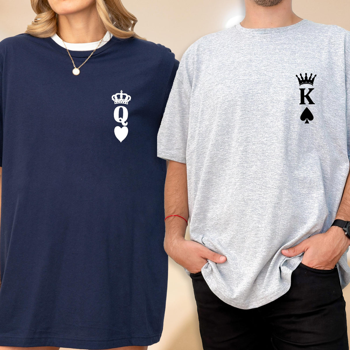 May include: Two short-sleeved t-shirts. One is navy blue with a white Queen of Hearts design, the other is gray with a King of Spades design. Both shirts have a relaxed fit and are suitable for casual wear.