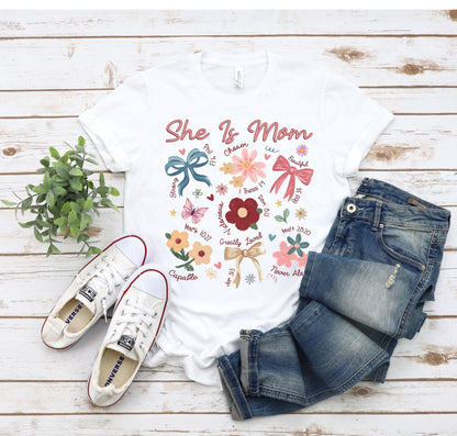 She Is Mom Shirt, Coquette Bow Tee, Praying Mama Tee, Religious Mom Shirt, Floral Bible Verse Shirt, Faith-Inspired Mom Gift