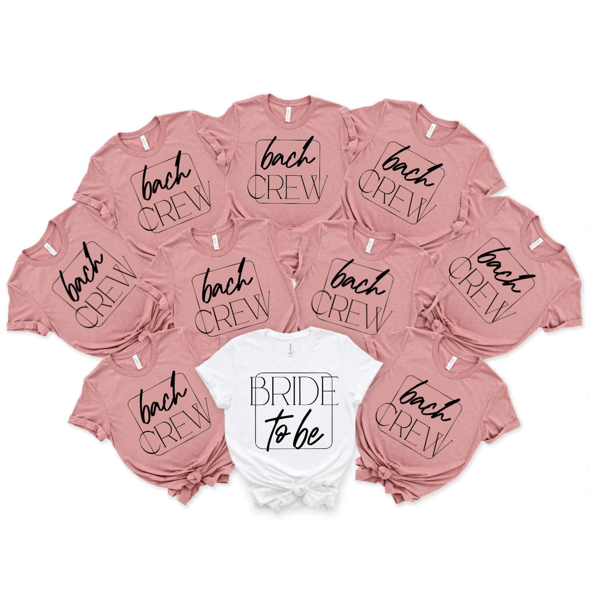 May include: Eight pink t-shirts with the text 'bach crew' in a black square and one white t-shirt with the text 'bride to be' in a black square.