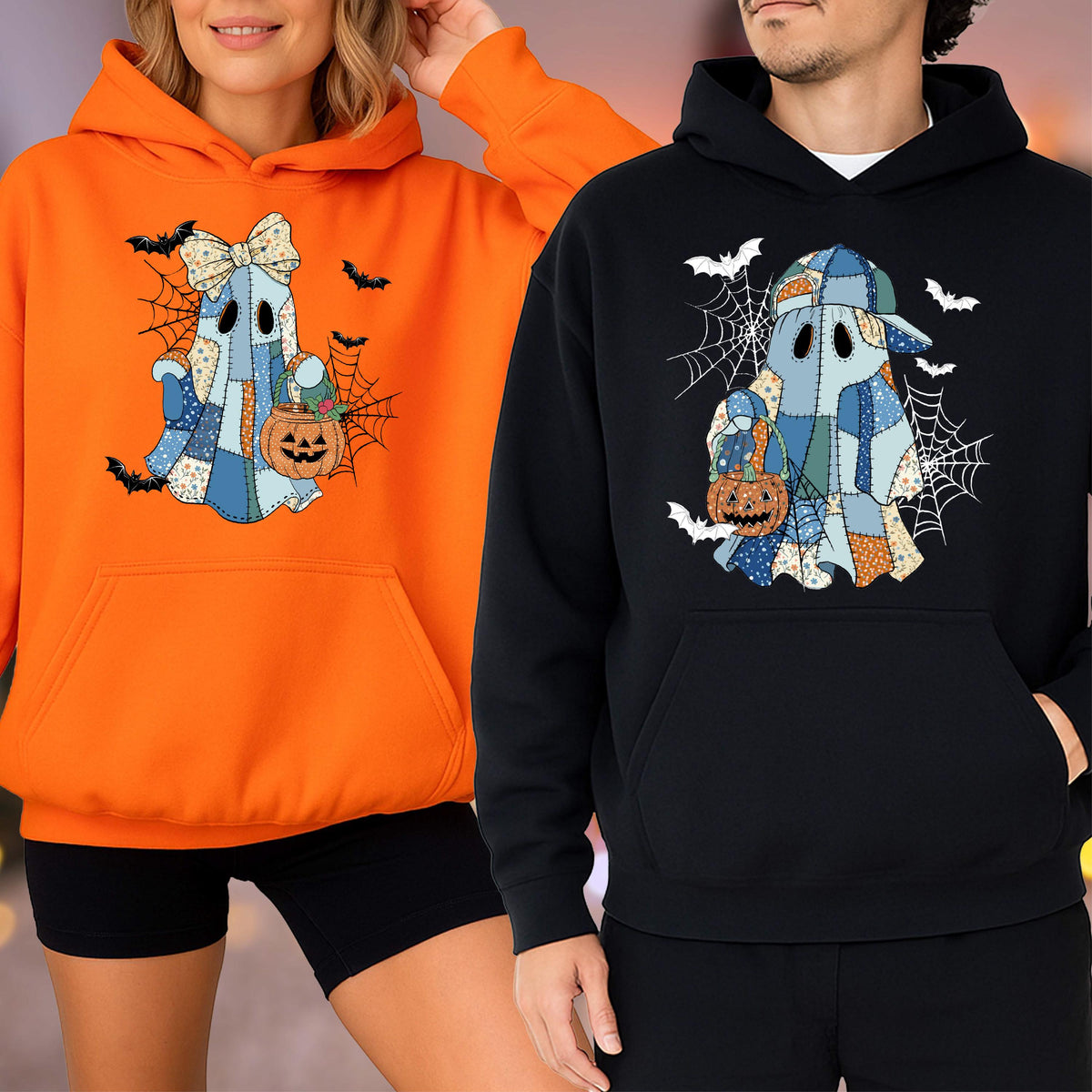 May include: An orange hoodie and a black hoodie, each featuring a graphic of a patchwork ghost wearing a hat and holding a jack-o'-lantern bucket. The ghost designs are surrounded by black spiderwebs and flying bats, printed on the front of the garments.