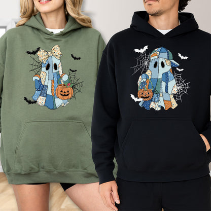 May include: An olive green hoodie and a black hoodie, each featuring a graphic of a patchwork ghost holding a jack-o'-lantern bucket. The ghost on the olive hoodie wears a bow, while the ghost on the black hoodie wears a baseball cap, both surrounded by spiderwebs and bats.