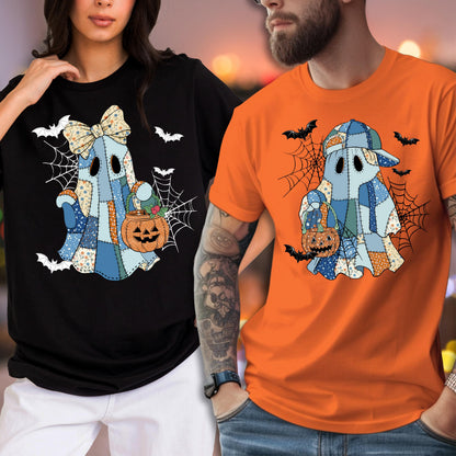 May include: A black t-shirt and an orange t-shirt, each featuring a graphic of a blue patchwork ghost holding a jack-o'-lantern. The ghost on the black shirt wears a bow, while the ghost on the orange shirt wears a baseball cap, both surrounded by spiderwebs and bats.