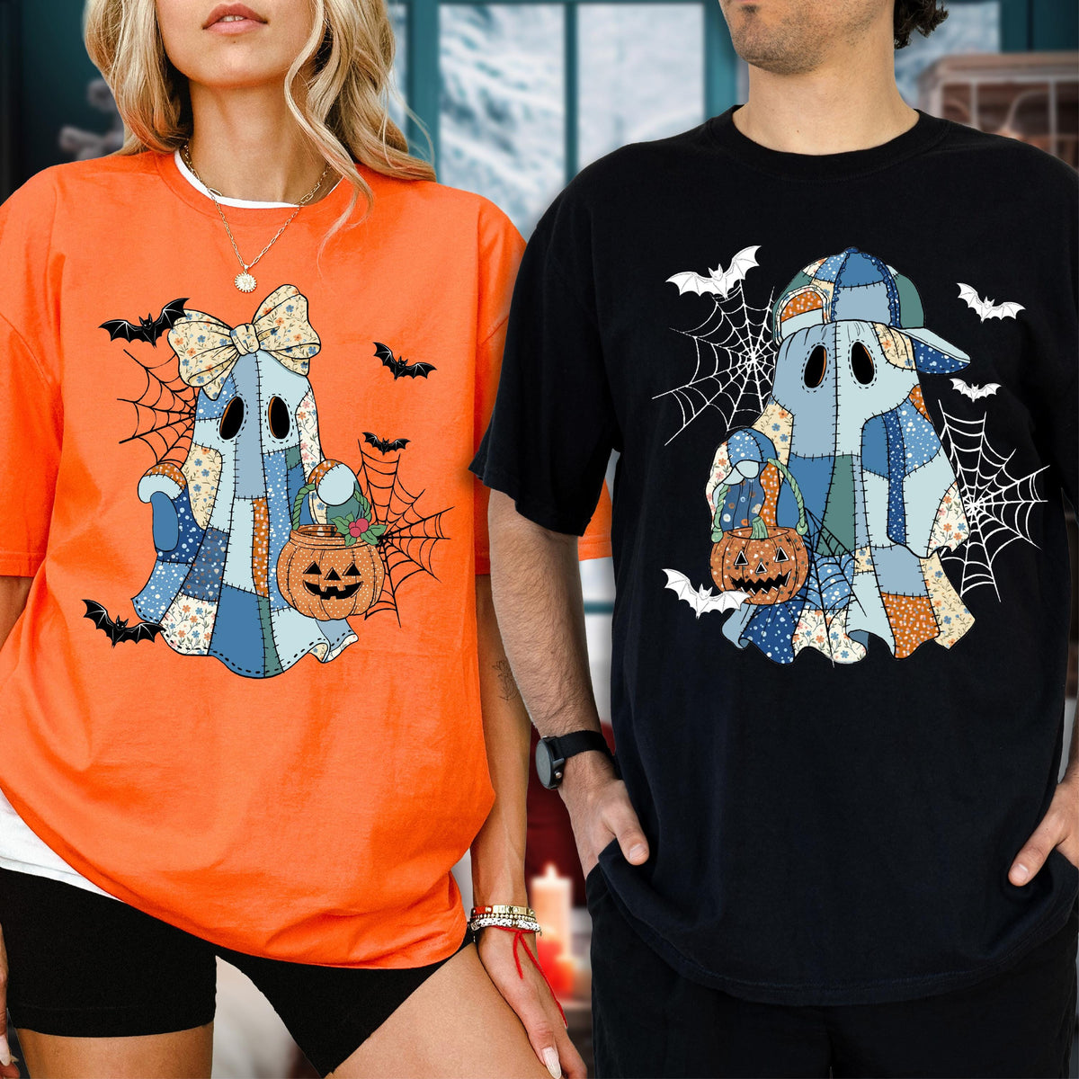 May include: Two short-sleeve t-shirts, one orange and one black, each featuring a graphic of a patchwork ghost holding a jack-o'-lantern. The ghosts are surrounded by spiderwebs and bats. The orange shirt ghost wears a bow, while the black shirt ghost wears a baseball cap.
