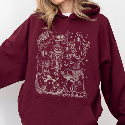 May include: Burgundy hoodie featuring a detailed cream-colored Halloween-themed graphic. The design includes a witch, ghosts, pumpkins, bats, skulls, and a crow. The hoodie has a drawstring hood and a kangaroo pocket.