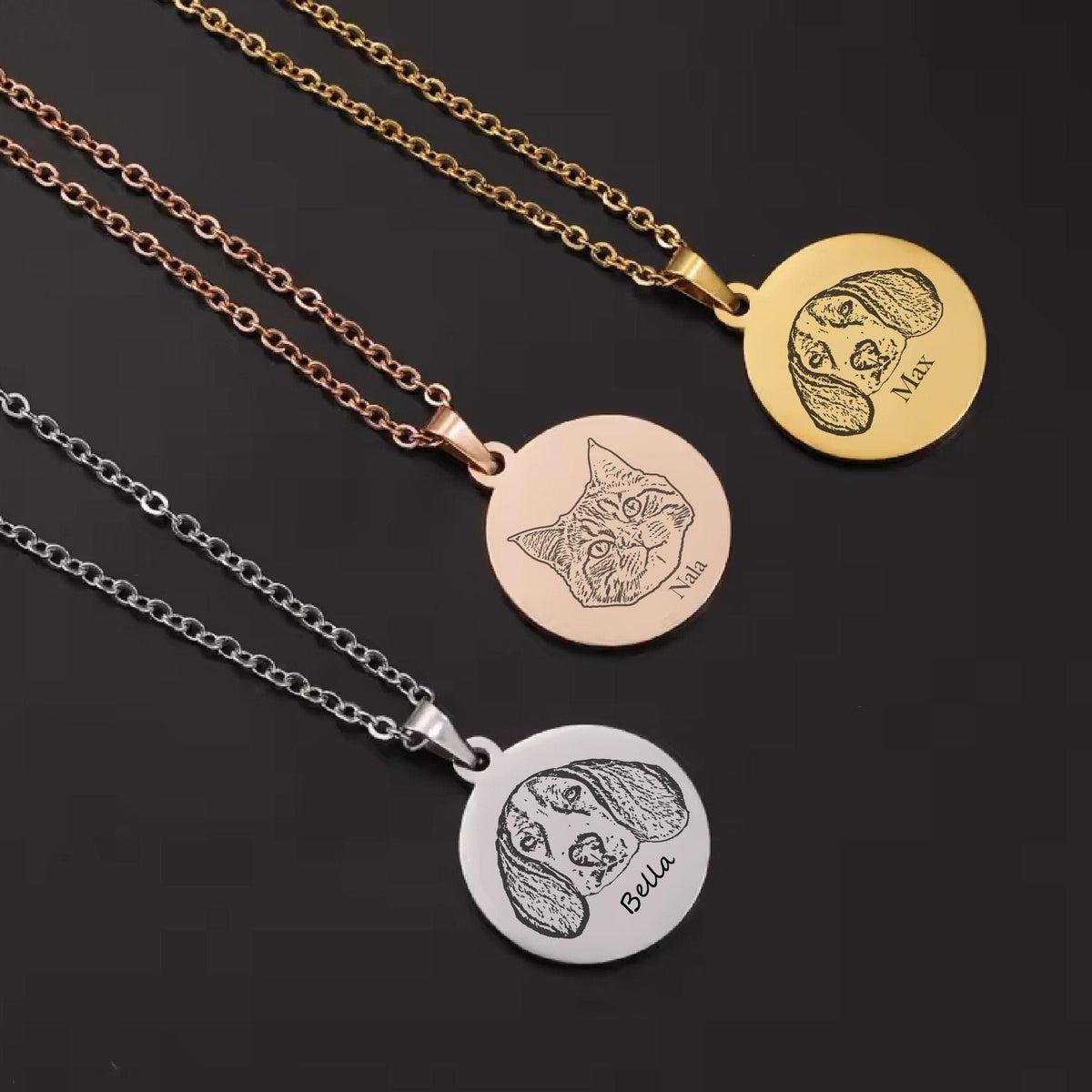 May include: Three personalized pet portrait necklaces. One gold-toned, one rose gold-toned, and one silver-toned. Each pendant features a detailed engraved pet portrait with the pet's name. The gold pendant says "Max", the rose gold pendant says "Nala", and the silver pendant says "Bella".