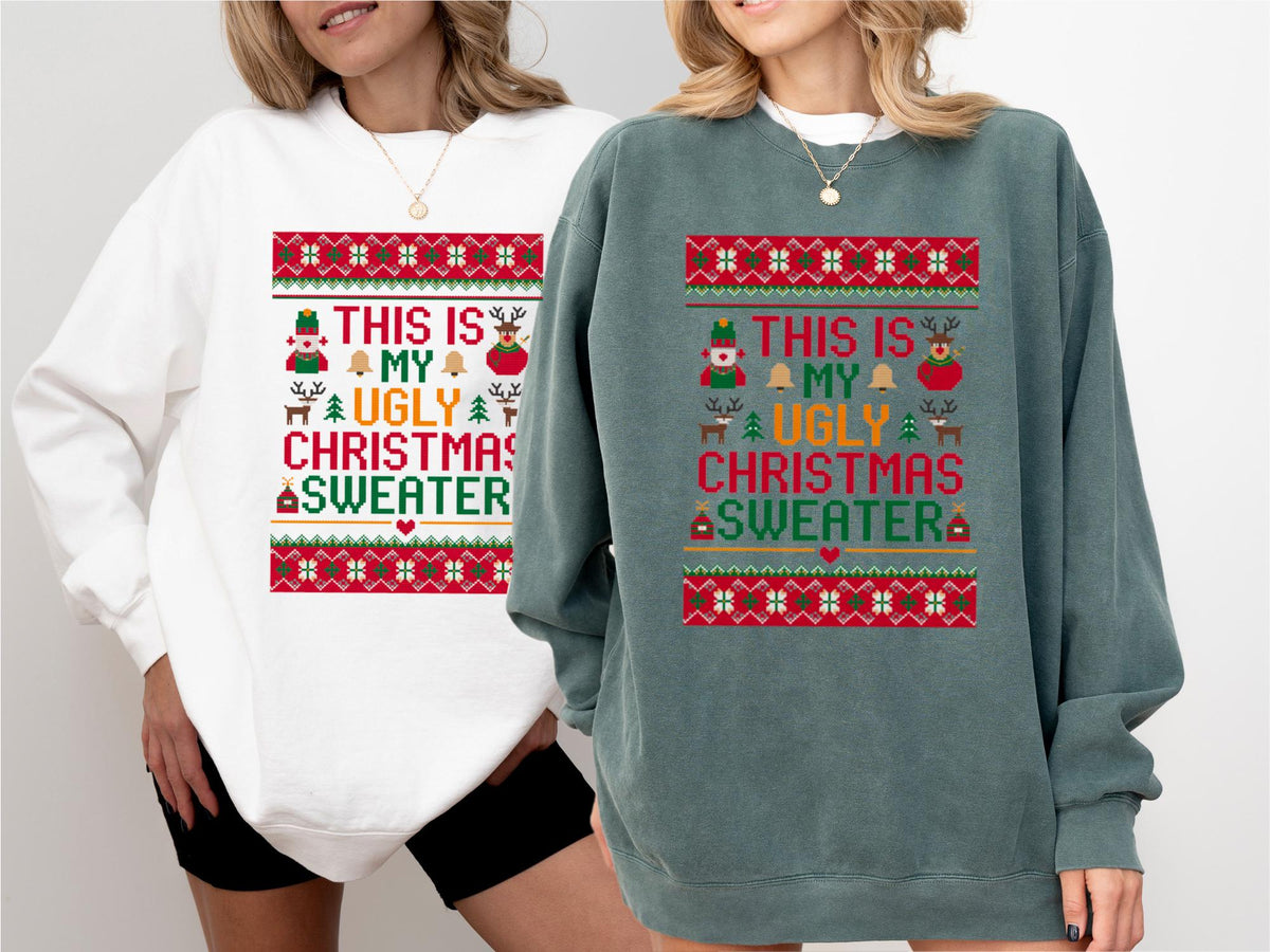 May include: Two sweatshirts, one white and one teal, feature a festive design. The design includes the text "THIS IS MY UGLY CHRISTMAS SWEATER" in a colorful, pixelated style, with holiday icons like a nutcracker, bells, and reindeer.