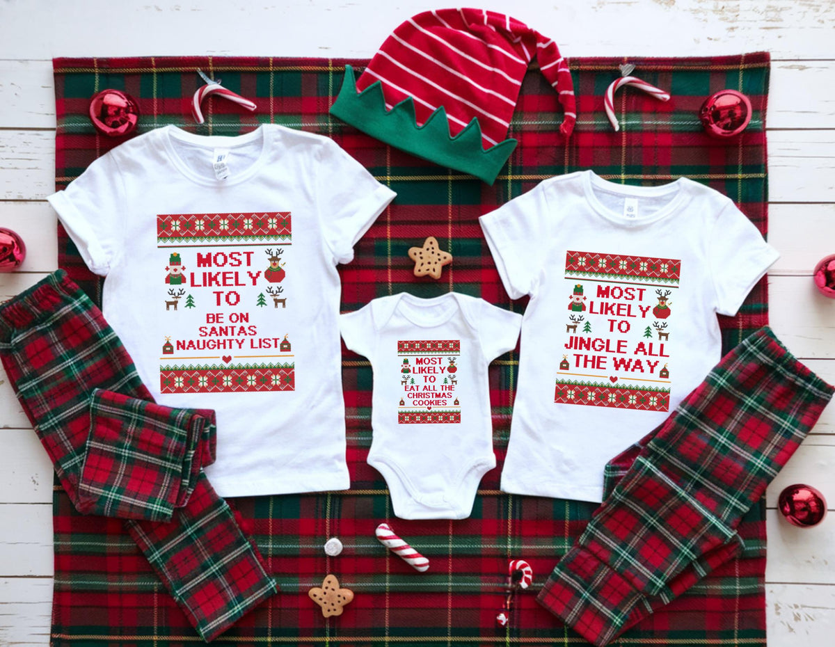 May include: White t-shirts and a onesie with matching red and green plaid pajama pants. The shirts have a festive design with the text "MOST LIKELY TO BE ON SANTAS NAUGHTY LIST" and "MOST LIKELY TO JINGLE ALL THE WAY".