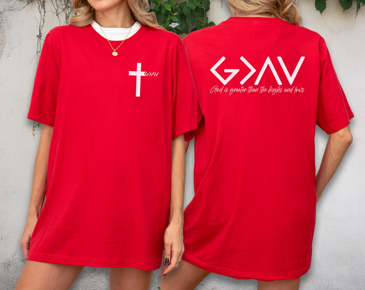 May include: Red t-shirt with a white cross and the letters "G>AV" on the front. The back of the shirt features the same letters and the phrase "God is greater than the highs and lows" in white.